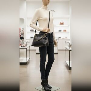 Plinio Visona Black Leather Shoulder Bag with Tortoise Accents